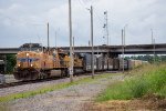 A westbound freight gets underway out of Riverfront Yard 